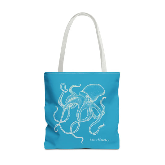 Turquoise tote bag with white octopus design and white handles