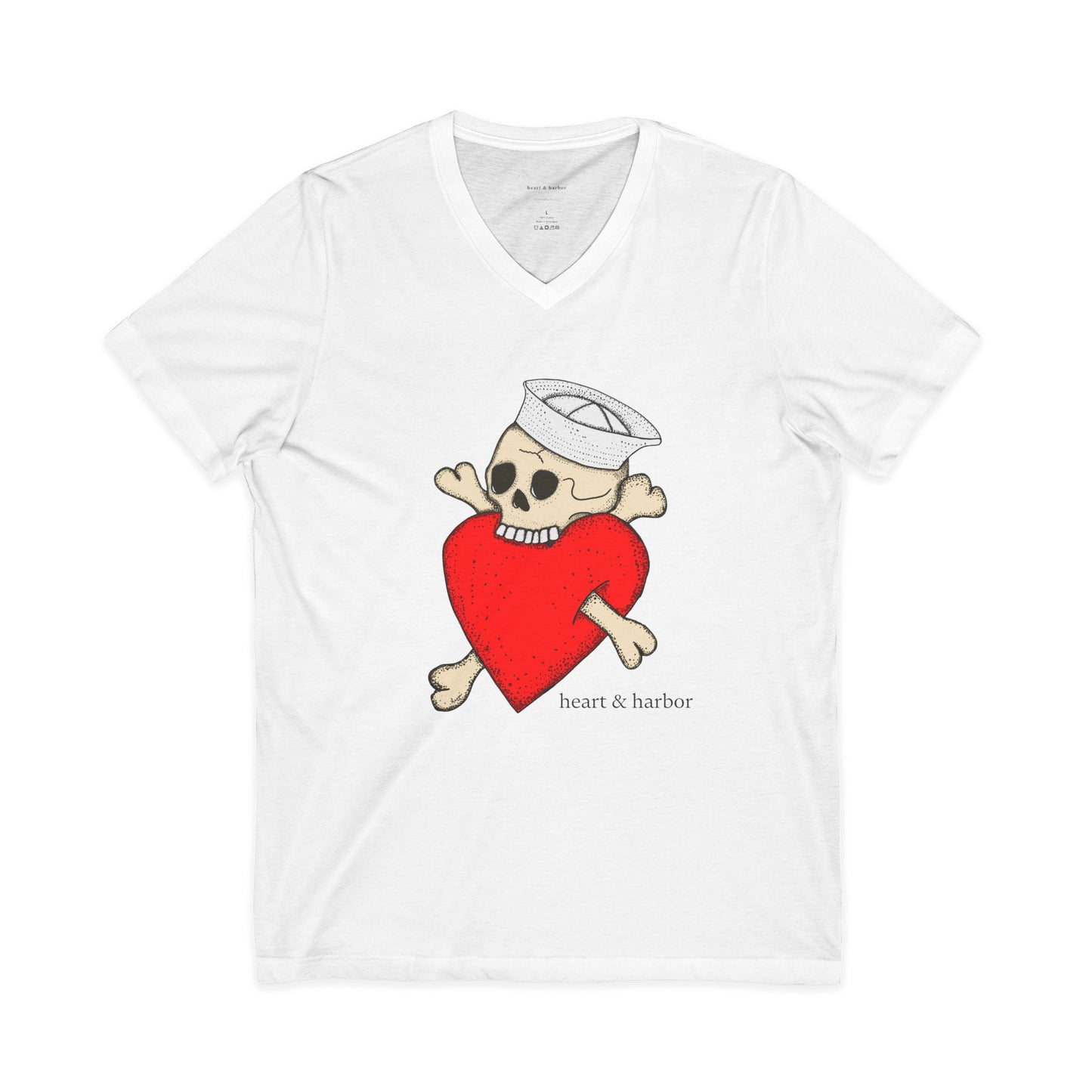White t-shirt with a graphic of a skeleton holding a red heart and a sailor's hat on a white background.