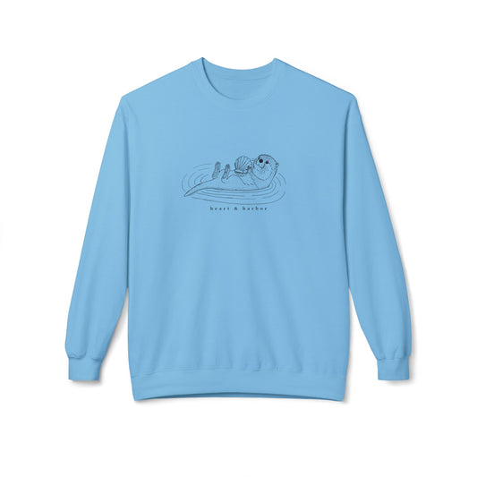 Light blue crewneck sweatshirt with hand-drawn sea otter.