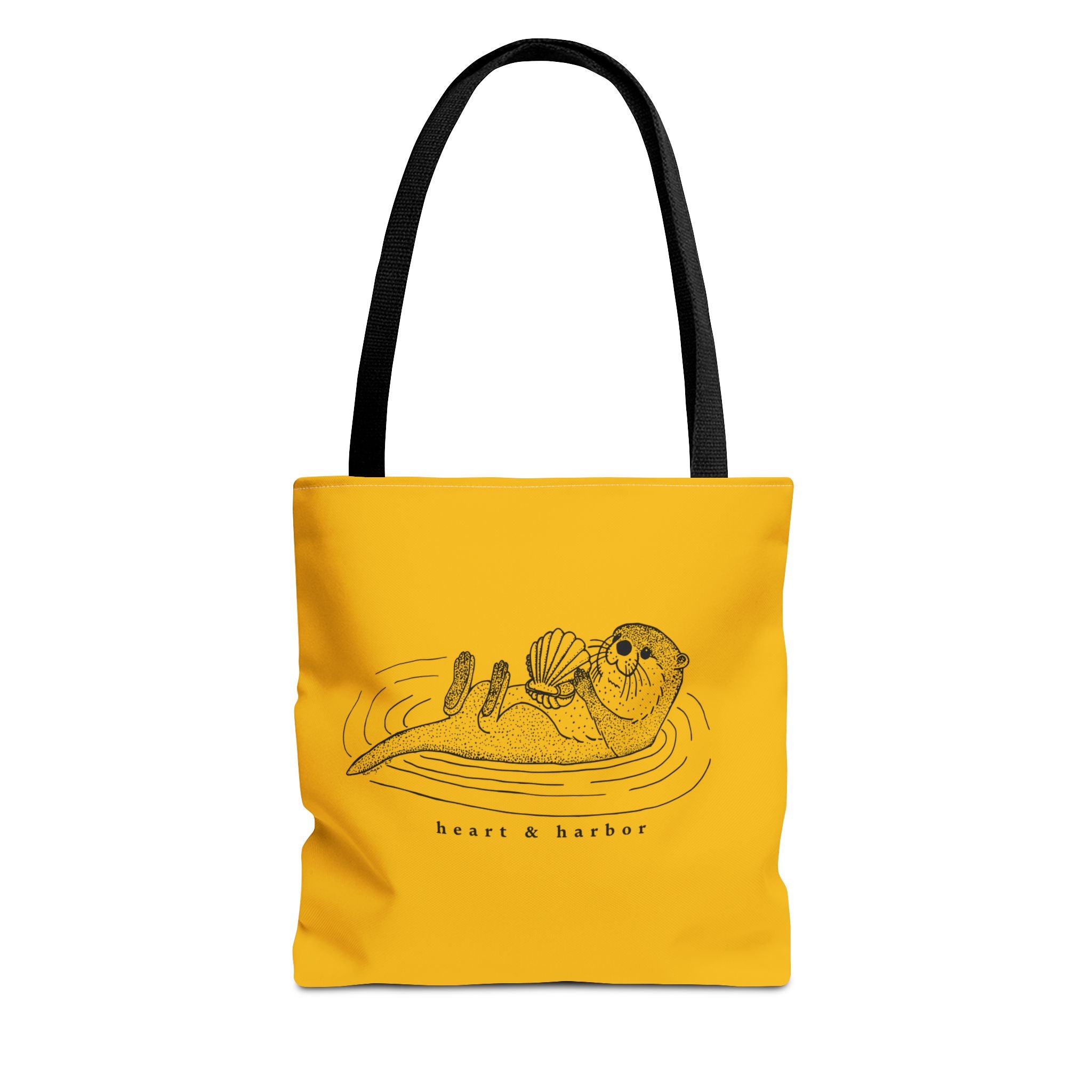 Yellow tote bag with hand-drawn sea otter by heart and harbor