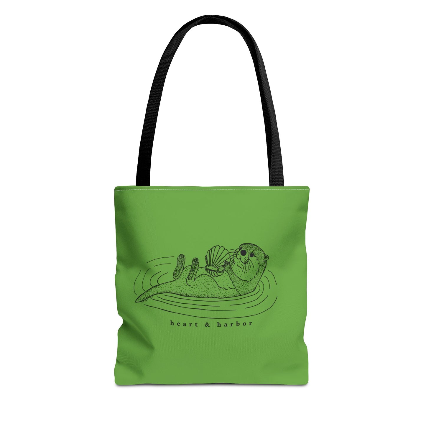 Green tote bag with hand-drawn sea otter by heart & harbor.