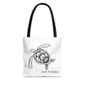 White tote bag with a hand-drawn sea turtle design by heart & harbor.