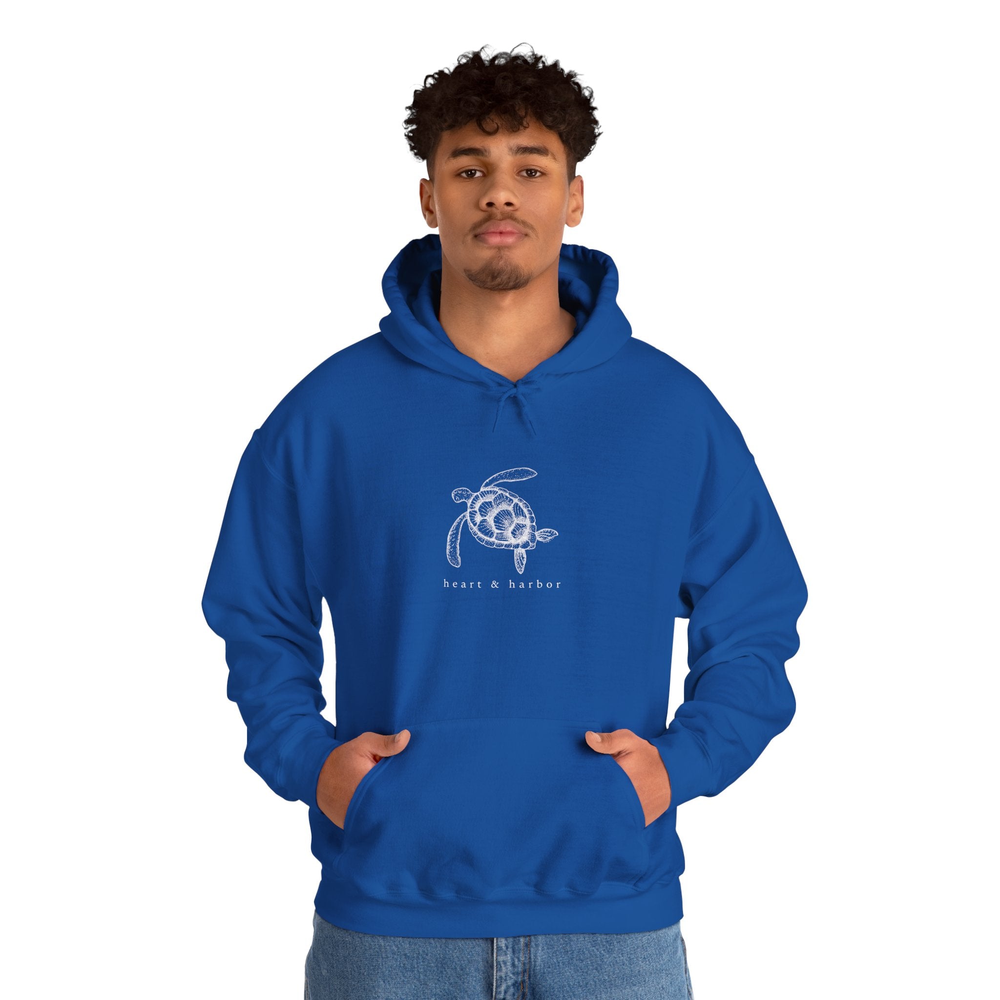 Navy hand-drawn sea turtle hoodie with coastal Heart & Harbor artwork