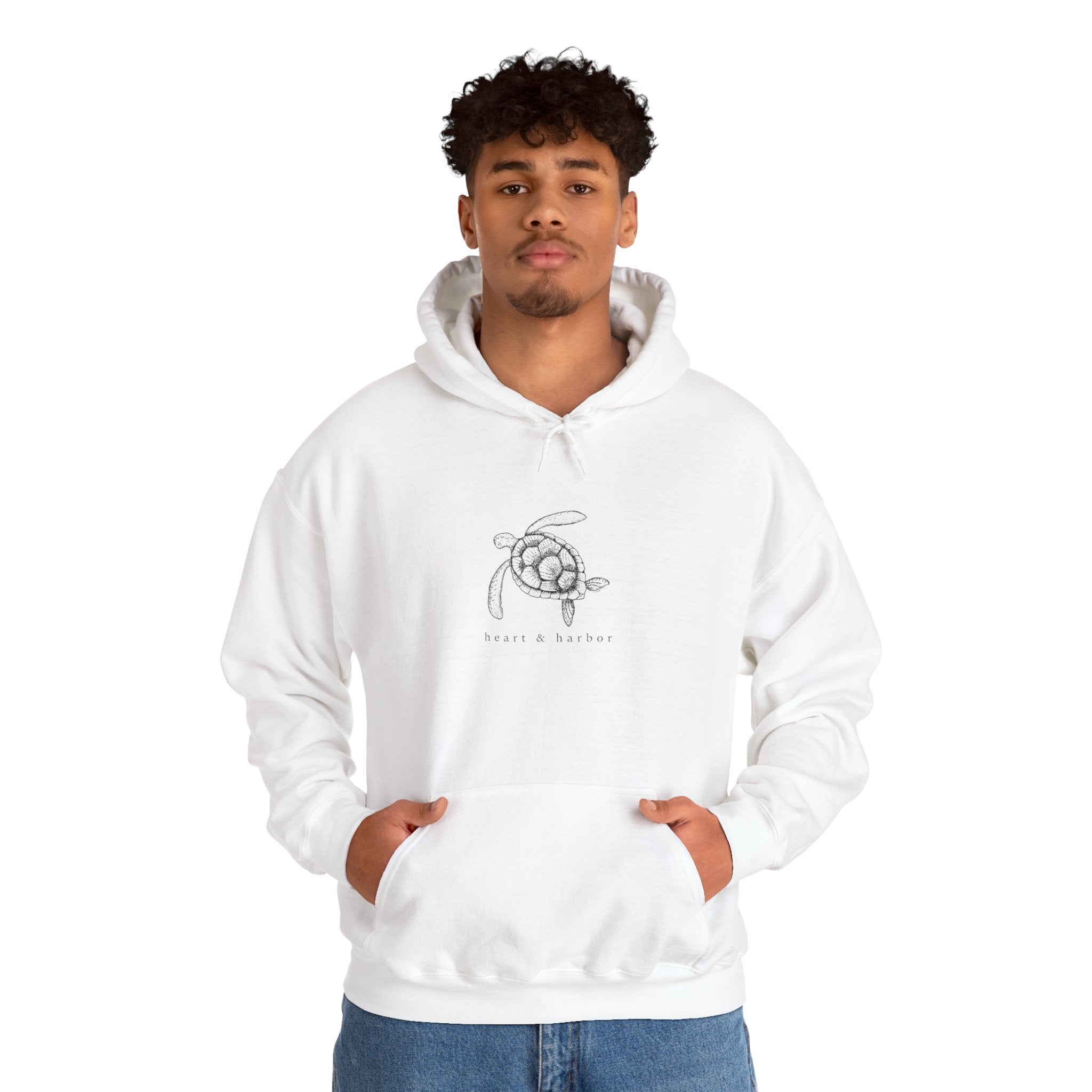 White hand-drawn sea turtle hoodie with coastal Heart & Harbor artwork