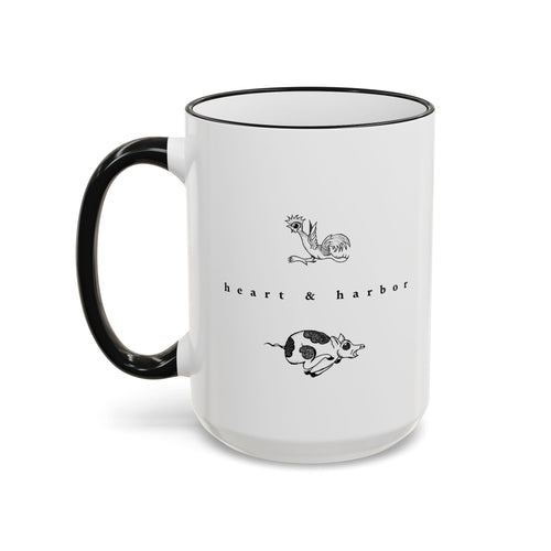 15 oz white ceramic mug with black interior and handle featuring original hand-drawn Chicken & Pig artwork