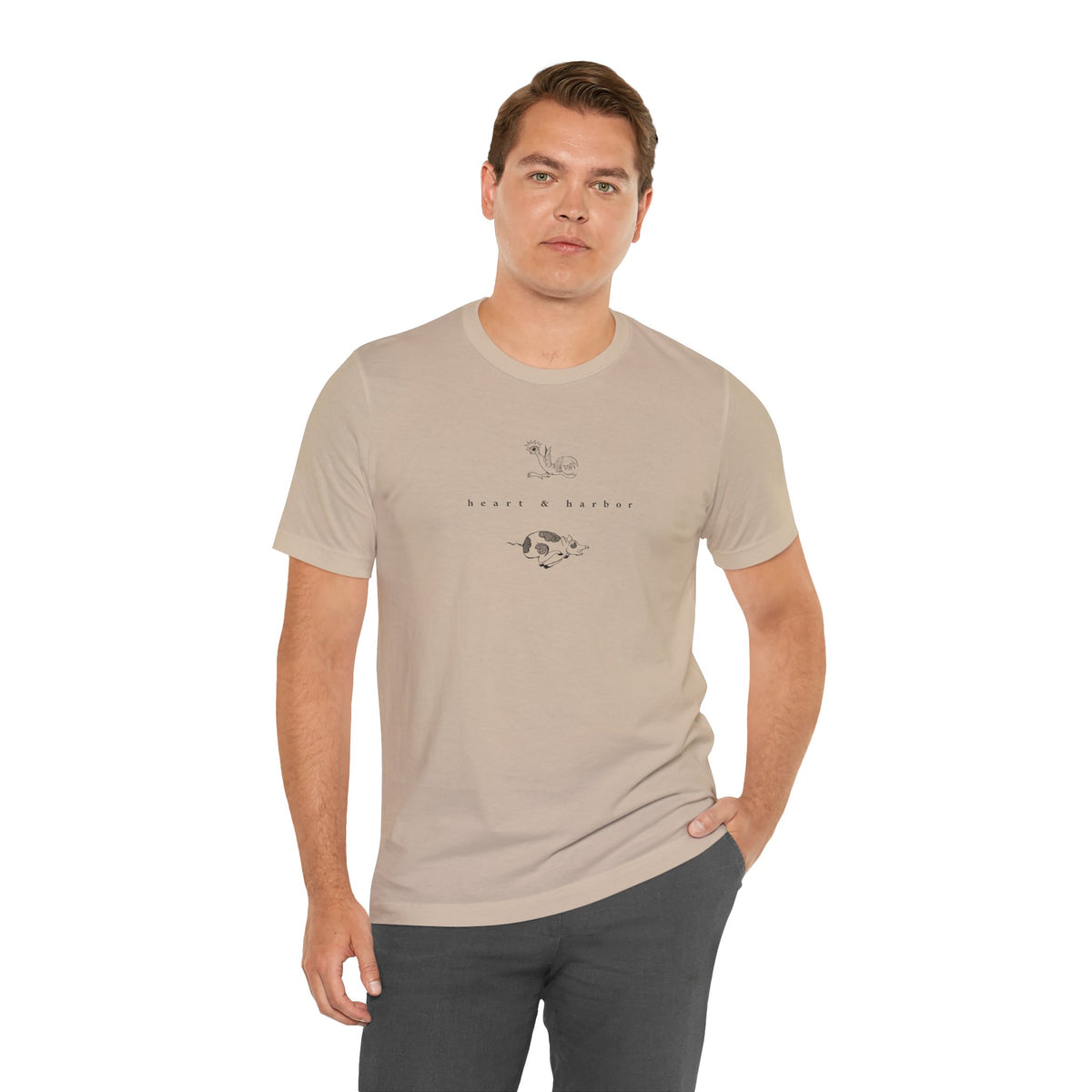 Tan unisex tee featuring Heart & Harbor Chicken & Pig artwork