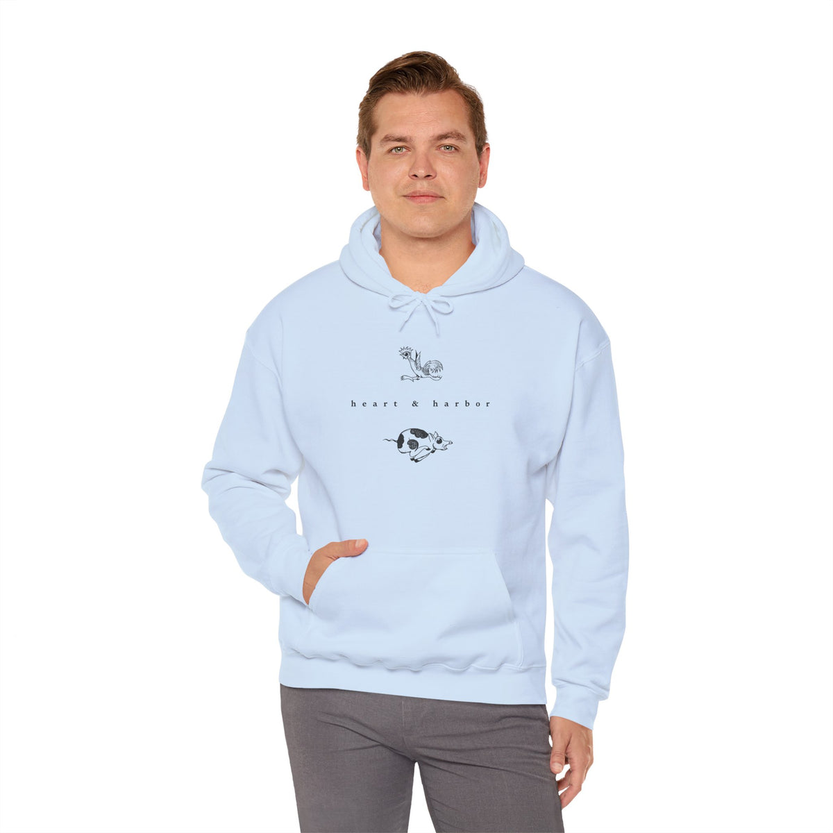 Light blue unisex hoodie featuring Heart & Harbor Chicken & Pig artwork