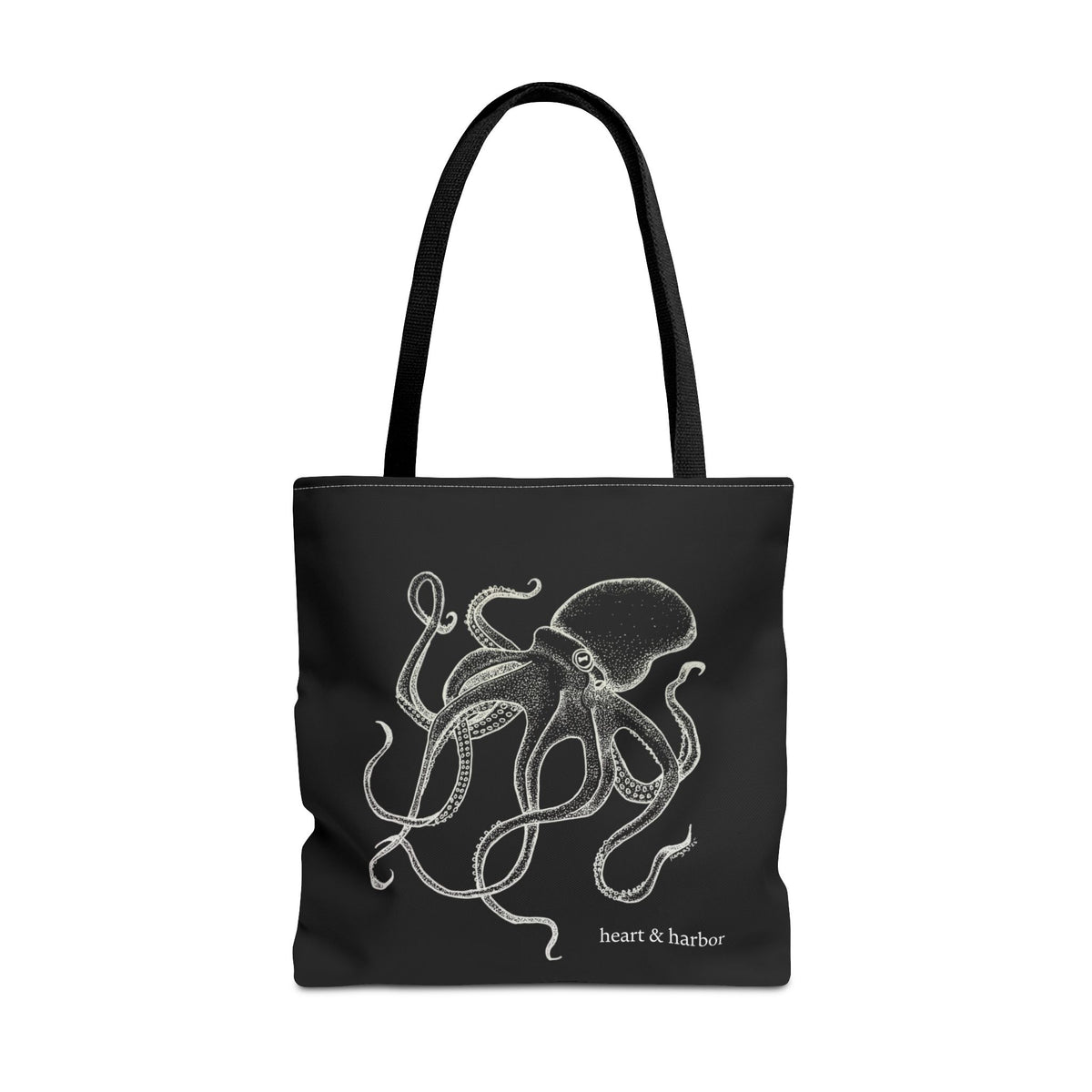 Black tote bag with black handles and original white Deep Octopus artwork by Heart & Harbor