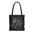 Black tote bag with black handles and original white Deep Octopus artwork by Heart & Harbor