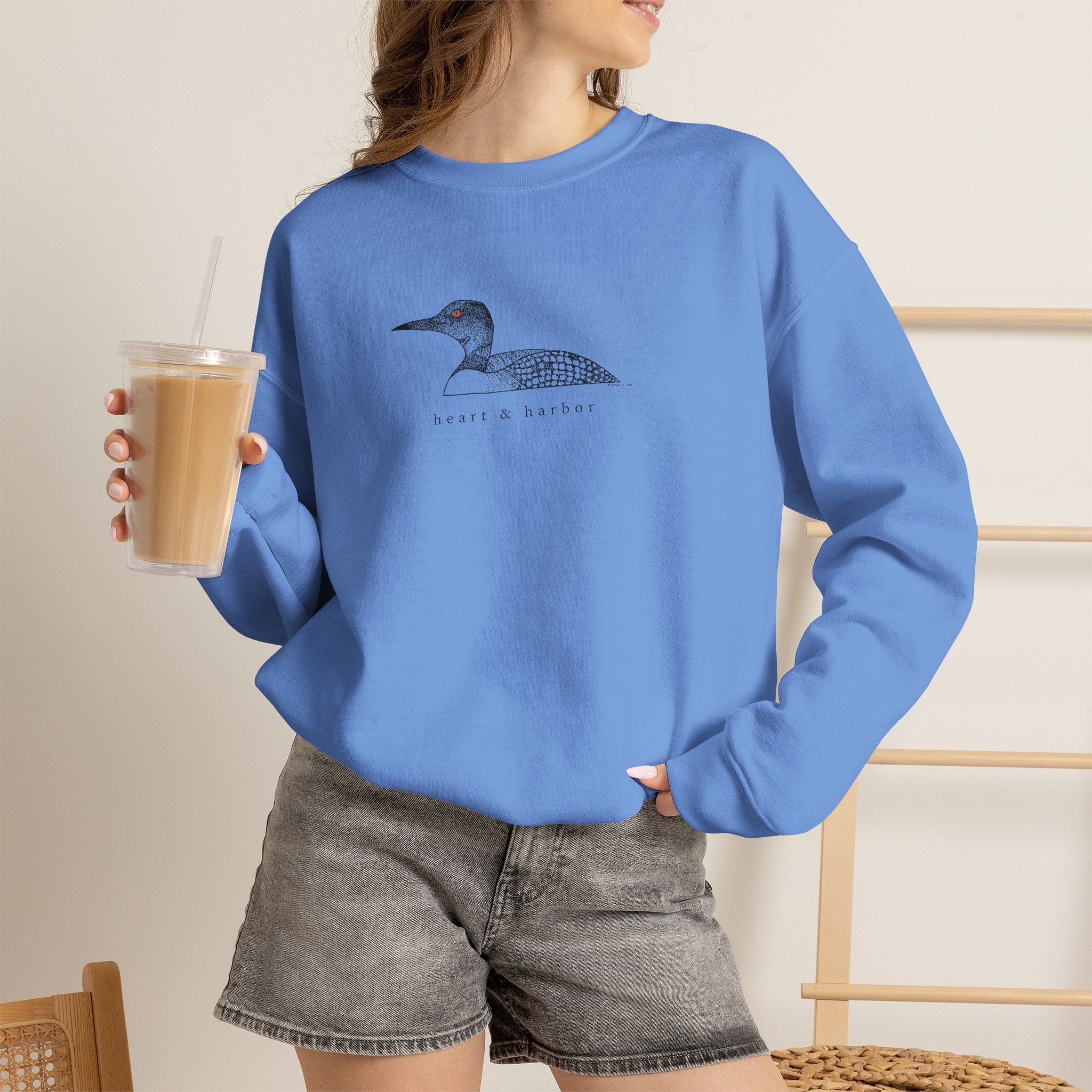 Hand-drawn loon crewneck sweatshirt from the Heart & Harbor Roots Collection