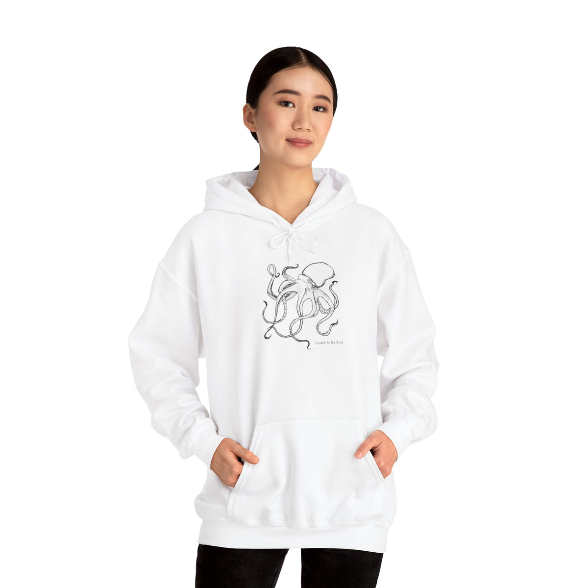 White unisex hoodie with original hand-drawn octopus artwork by Heart & Harbor