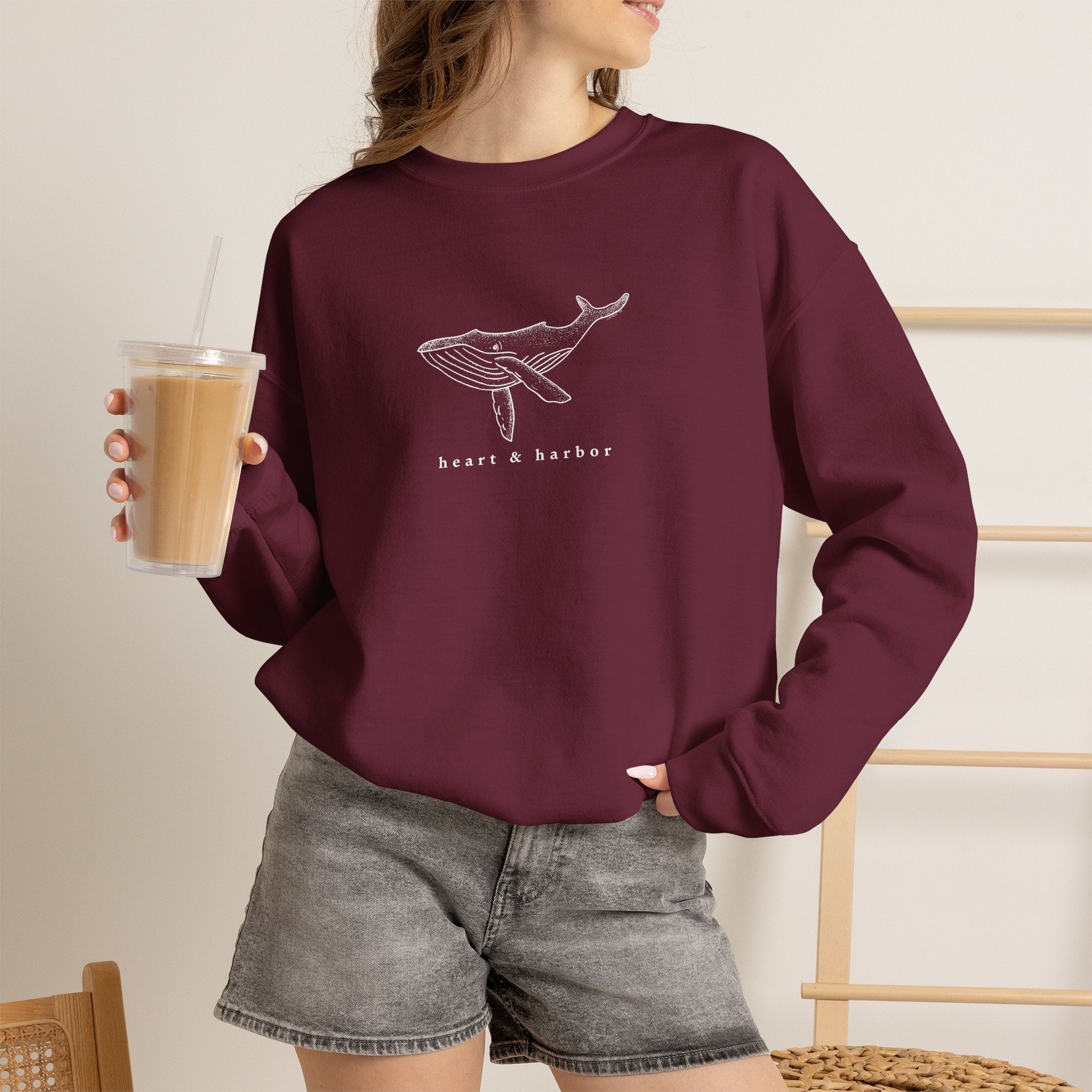 Heart & Harbor hand-drawn whale crewneck sweatshirt with original coastal artwork