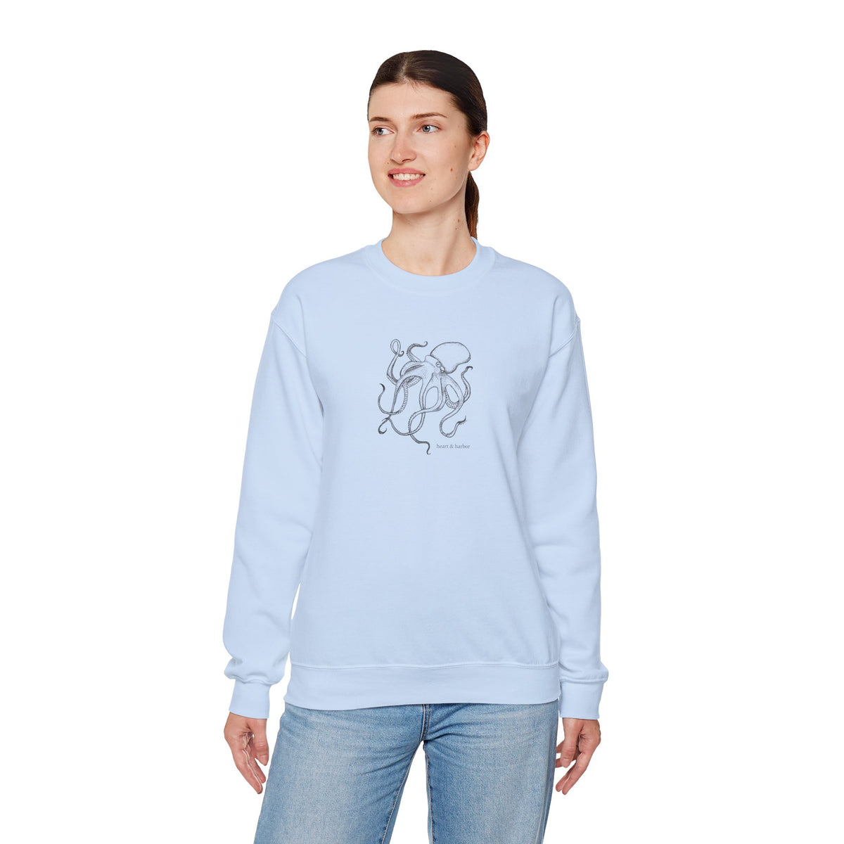 Light blue unisex crewneck sweatshirt with original hand-drawn octopus artwork by Heart & Harbor