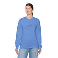 Carolina blue unisex crewneck sweatshirt with original hand-drawn sea otter artwork by Heart & Harbor