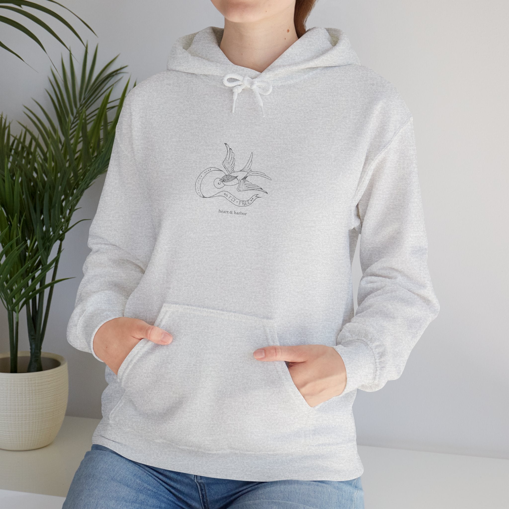 Heart & Harbor swallow hoodie with traditional nautical-inspired bird artwork