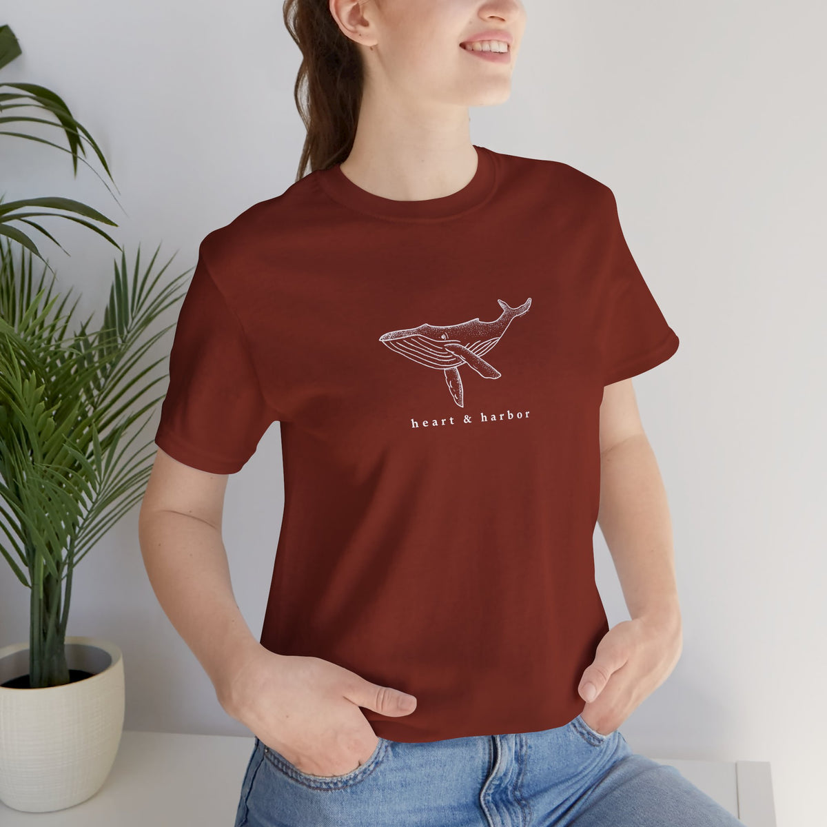 Rust unisex T-shirt featuring original Deep Water Whale coastal artwork 